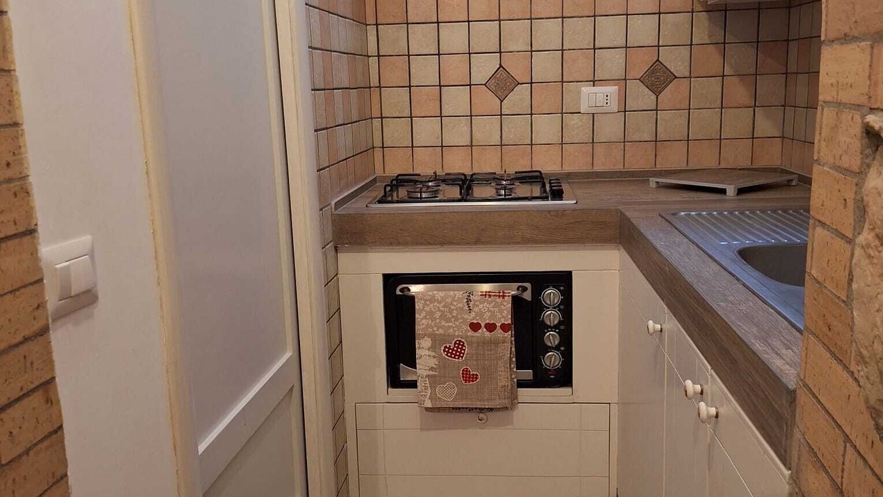 Photo of Kitchen in Piazza-Tralia-Pendolo