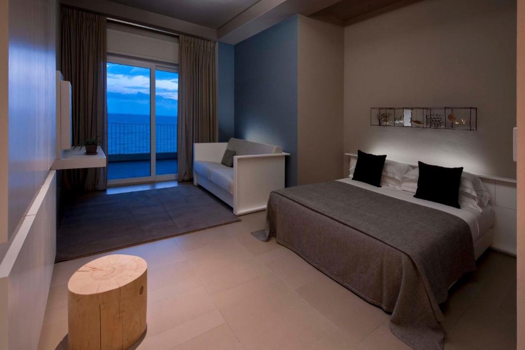 Photo of Bedroom in Lido di Capo Portiere