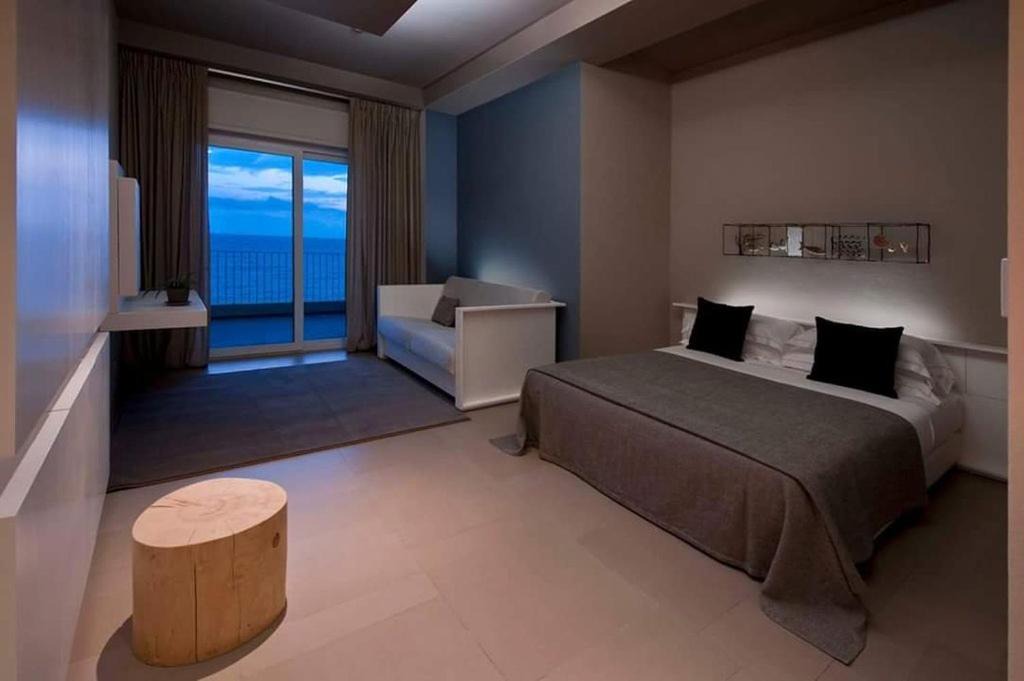 Photo of Bedroom in Lido di Capo Portiere
