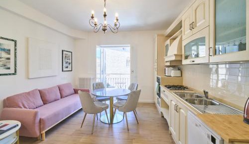 One-Bedroom Apartment with Balcony and City View