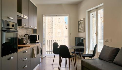 One-Bedroom Apartment with Balcony and City View