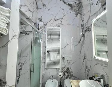 Quadruple Room with Private Bathroom
