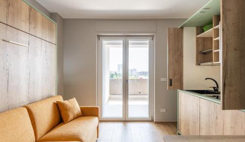 One-Bedroom Apartment with Balcony and City View