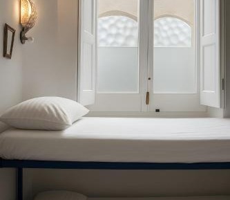 Single Bed in Female Dormitory Room