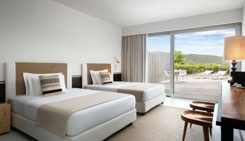 Queen Room with Two Queen Beds and Balcony - Courtyard View