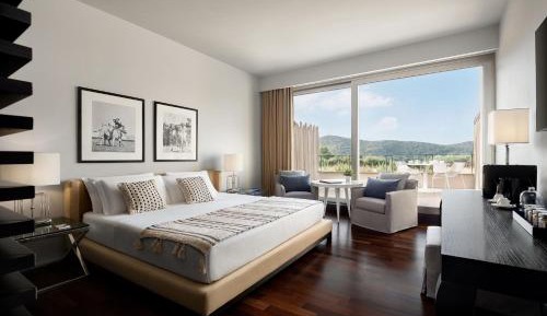 Junior King Suite with Balcony and Golf View