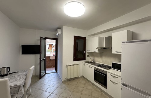 Zona XXX Castel Fusano Apartment | Vrbo Property